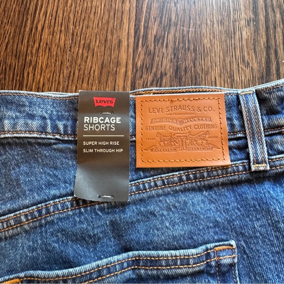 LEVI’S Ribcage High Rise Denim Shorts - Picture 6 of 8